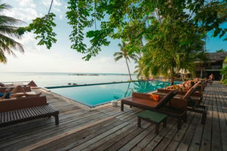 brown-wooden-table-and-chairs-on-brown-wooden-deck-near-body-of-water-during-daytime.jpg brown wooden table and chairs on brown wooden deck near body of water during daytime